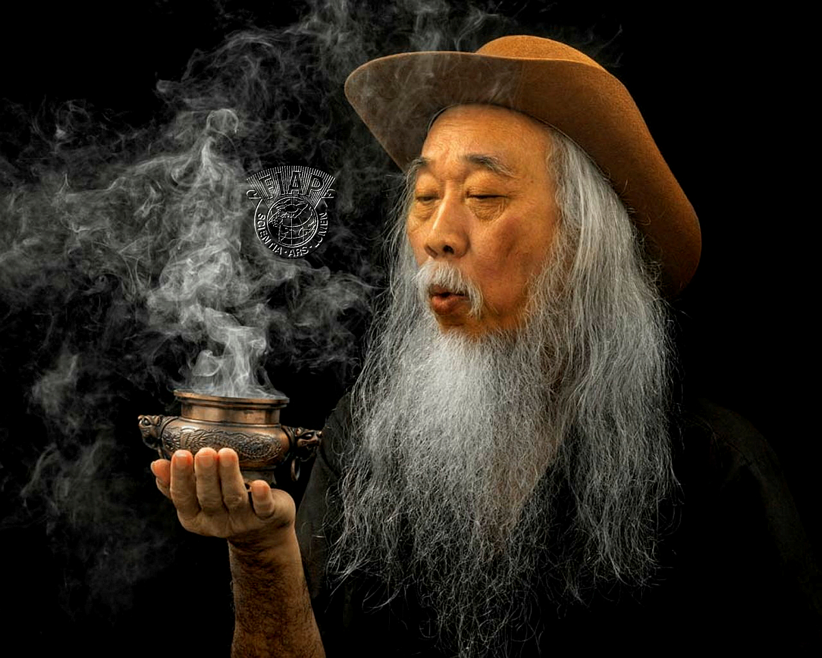 104_Khing Sandar Tin_Blowing smoke.jpg