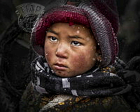 2094_Jinsong_Yan_Tibetan boy in the snow.jpg