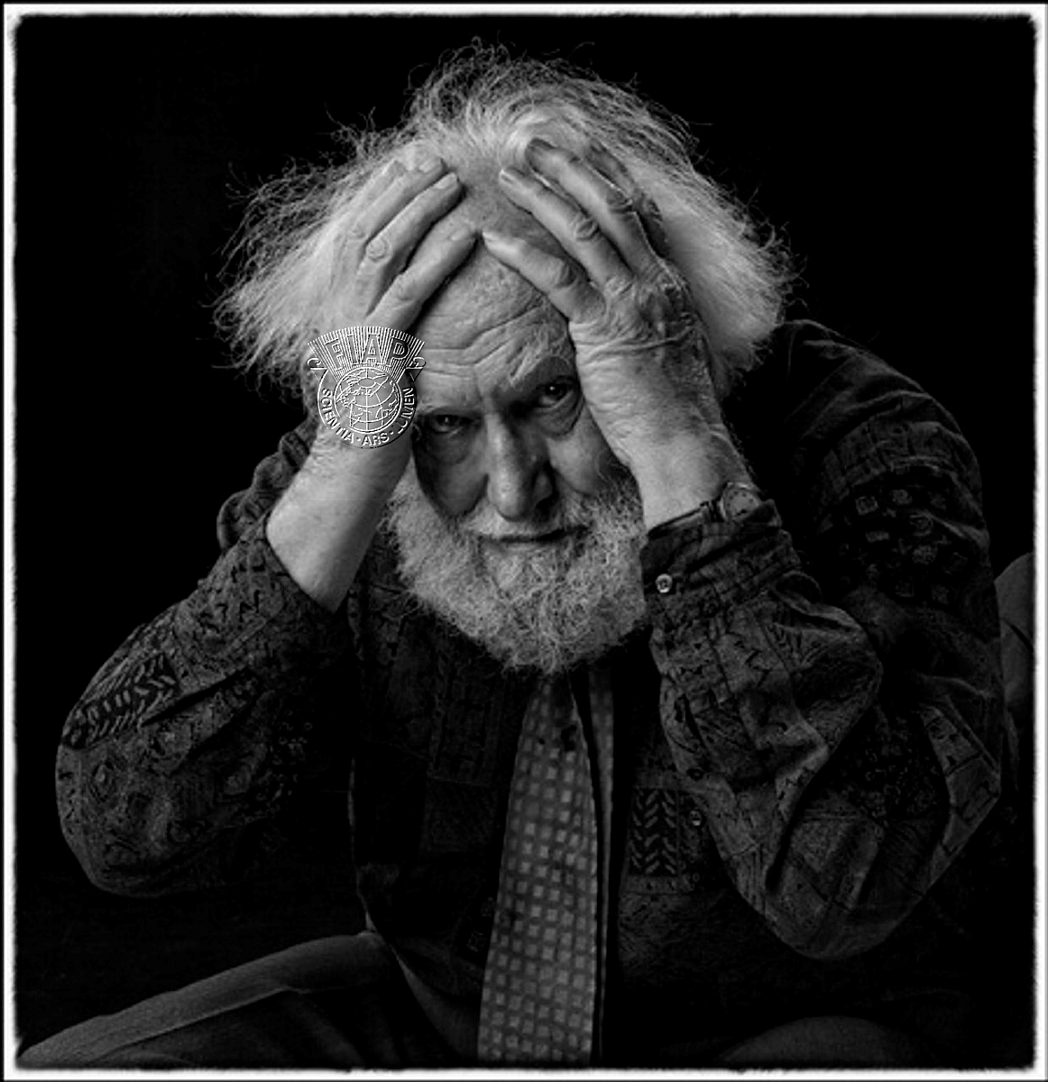 G04_Ian_Ledgard_Hands on head.jpg